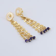 Cargar imagen en el visor de la galería, Collar triple, dos cadenas y Lapislázuli, dijes Olas y Mandala. Aretes a juego incluídos.