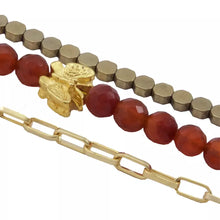 Cargar imagen en el visor de la galería, Collar triple de Cornalina, Hematita y cadena con Ojo Protector, hoja de la fortuna y símbolo OM. Aretes a juego incluidos.