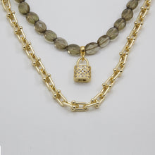 Cargar imagen en el visor de la galería, Collar doble de Cuarzo Ahumado y Hematita con dije de Candado. Aretes a juego incluídos.