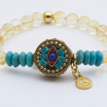 Cargar imagen en el visor de la galería, Pulsera Citrino y Turquesa, dije de Turquesa, Coral, Lapislázuli y colgante de Amor y Paz.