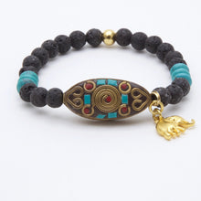 Cargar imagen en el visor de la galería, Pulsera Piedra Volcánica y Turquesa, dije Turquesa, Coral y Elefante.