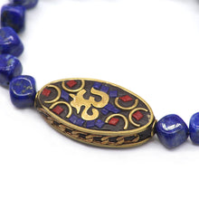 Cargar imagen en el visor de la galería, Pulsera de Lapislázuli con dije de Coral y Lapislázuli.