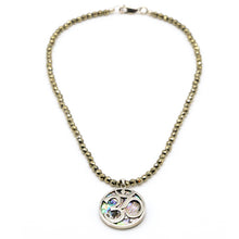 Cargar imagen en el visor de la galería, Collar de Hematita con dije de Concha con símbolo OM.