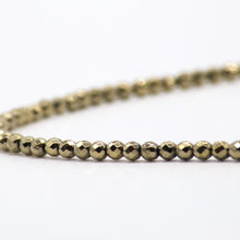 Cargar imagen en el visor de la galería, Collar de Hematita con dije de Concha con símbolo OM.