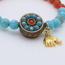 Load image into Gallery viewer, Turquoise and Carnelian bracelet with Turquoise and Coral charm with elephant.
