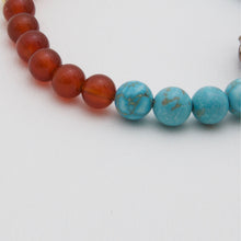 Load image into Gallery viewer, Turquoise and Carnelian bracelet with Turquoise and Coral charm with elephant.
