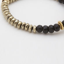 Load image into Gallery viewer, Onyx and Hematite bracelet with Amber center piece.
