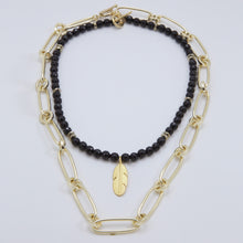 Load image into Gallery viewer, Double necklace with Onyx and chain with feather pendant. Matching earrings included.

