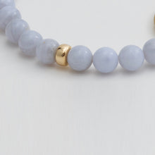 Load image into Gallery viewer, Blue Lace Agate Bracelet with oval zebra charm with spiral snail.
