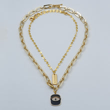 Load image into Gallery viewer, Double chain necklace with Protective Eye and NAMASTE charms. Matching earrings included.
