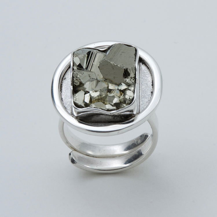 Adjustable ring with rectangular Pyrite. Round bezel