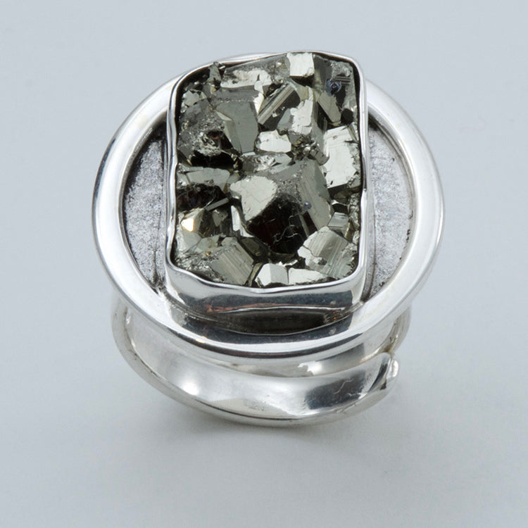 Adjustable ring with rectangular Pyrite. Oval bezel