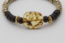 Load image into Gallery viewer, Onyx and Hematite bracelet with Amber center piece.
